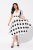Sukienka Retro Lata 50. Pin-Up Rockabilly – Audrey Style  Biała w Czarne Grochy (1).png