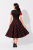 Czarna sukienka vintage pin up w czerwone grochy – widok tyłu modelki retro style